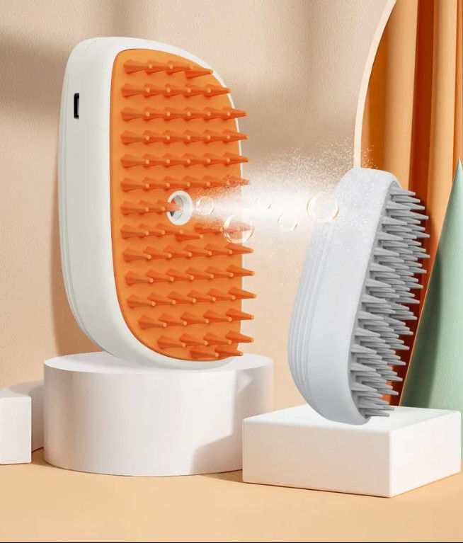 Fabbrica all'ingrosso 3 in 1 spazzola a vapore per massaggi per animali domestici Spray di pulizia dell'acqua Vendita calda depilazione di gatti spazzola a vapore con Lig